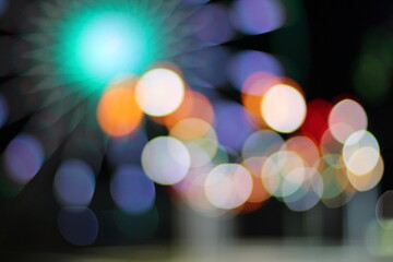 City light. A background for designers. Bokeh light. Colored light.