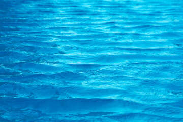 water of sea is so clear that you can see sand and shells in water