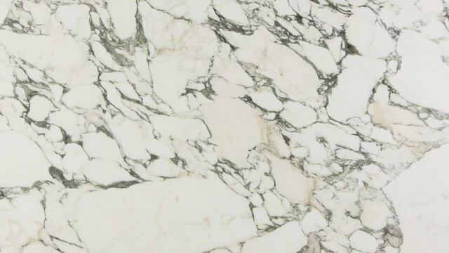 Beautiful White Carrara Marble With Natural Pattern And Streaks Of Grey Design. - panning shot