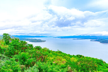 Beautiful scenery views of nature with a large reservoir above the Srinagarind Dam at Rai Ya Yam in Si Sawat District, Kanchanaburi Thailand.