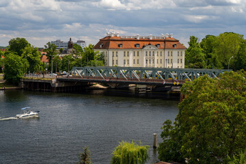 Castle palace district Koepenick in Berlin, Germany summer view of river and bridge popular destination for boating and tourism