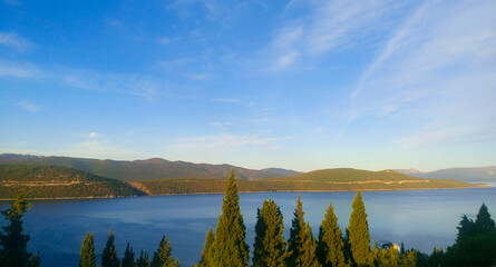 Beautiful landscape of mountains and lake with pine trees, Croatia. Lake, bay, bay.