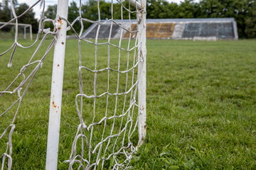 old white gate on the football field. Sports outdoors