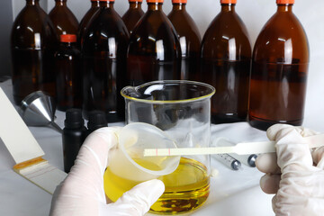 The process of making the essential oil , testing the scent ,  measure and pour the aroma oil into...