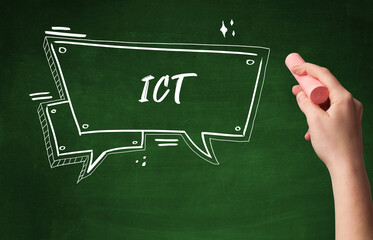 Hand drawing ICT abbreviation with white chalk on blackboard