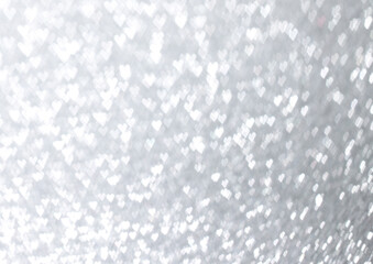 background with heart shape snow bokeh out of focus 