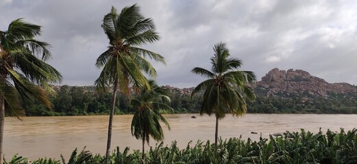 Fototapeta na wymiar river near to a temple in hampi