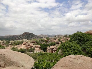 landscape view of rocks and hills in hampi 