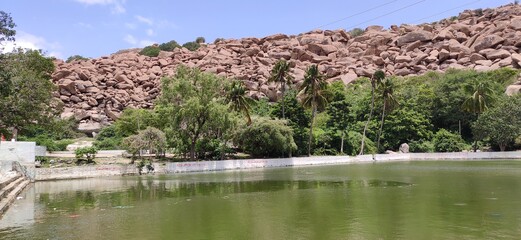 river that is across the historical town hampi , lakes