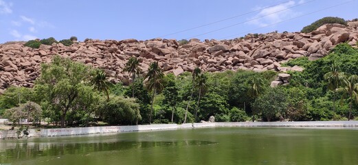 river that is across the historical town hampi , lakes