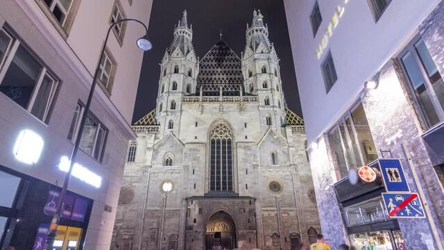 St. Stephen's Cathedral night timelapse hyperlapse (Stephansdom, Domkirche St. Stephan), the mother church of Roman Catholic Archdiocese of Vienna and one of the tallest churches in the world