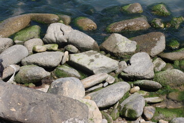 Fototapeta na wymiar Sea pebble. Sea stones background. Beach rocks.