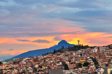 View of the city of Quito with the Panecillo at sunset