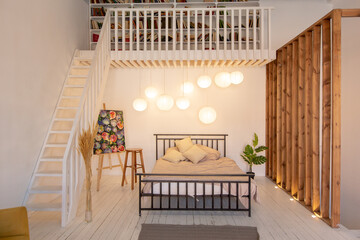 luxury modern design of a cozy small Scandinavian-style studio apartment with white walls, second floor with a library and huge high window full of day light