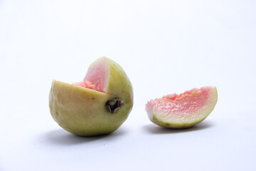 fresh red guava pieces with isolated white background
