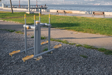 Fototapeta na wymiar Public exercise equipment in the city park