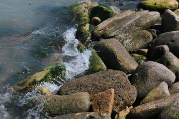 Sea pebble. Sea stones background. Ocean beach rocks.