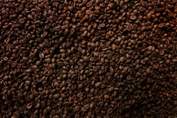 Freshness hot  coffee with coffee beans background
