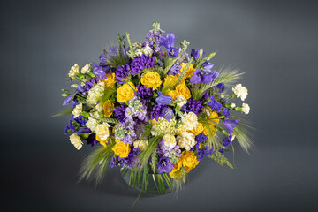 Big and small bouquet on grey background