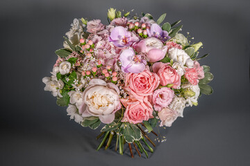 Big and small bouquet on grey background