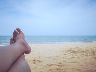 Relax moment at the beach. Personal perspective view on the beach