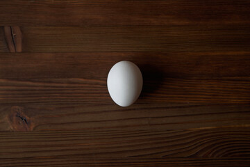 Eggs on a wooden table. View from above.
