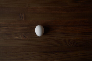 Eggs on a wooden table. View from above.