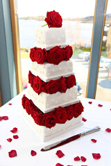 wedding cake with rose petals
