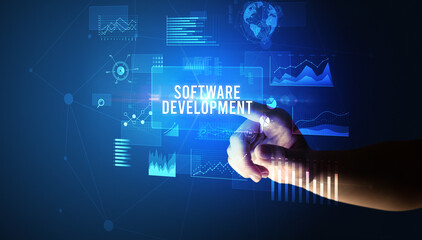 Hand touching SOFTWARE DEVELOPMENT inscription, new business technology concept