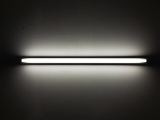 LED Fluorescent light tube on ceiling or wall.