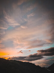 Cloudy sunset over the mountains