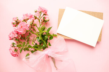 layout postcard for congratulations and invitations.  bouquet of pink roses with blank card