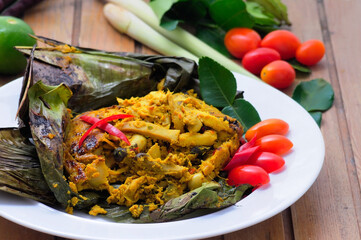 Mushroom mixed with hot curry paste Wrapped in banana leaf grilled like local food Southern Thailand