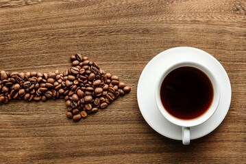 Arrow-shaped coffee beans indicate a cup of coffee.