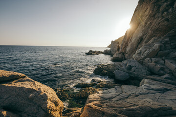 A close up of a rock near the ocean