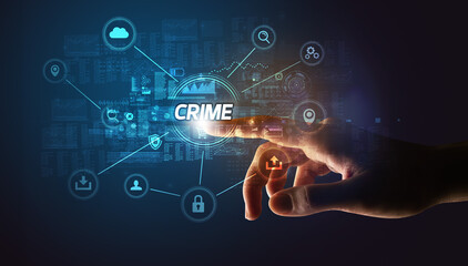 Hand touching CRIME inscription, Cybersecurity concept