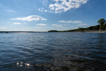 Lake view on a sunny summer day. Time for rest and vacation.