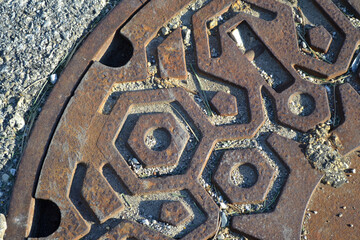 A Rusted Storm Drain Lid