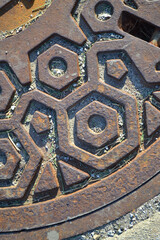 A Rusted Storm Drain Lid