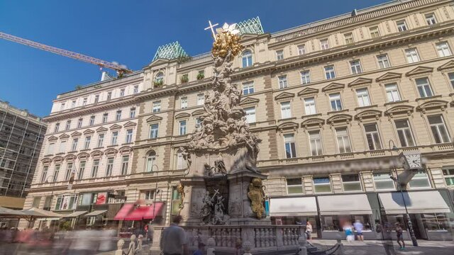 Memorial Plague column (Pestsaule) and tourists on Graben street Vienna timelapse hyperlapse. The Graben is one of the most famous streets in Vienna first district, the city centre.