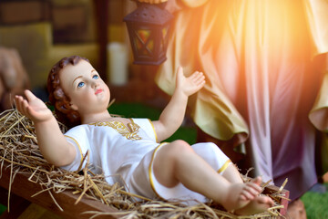 Statuettes of baby Jesus,The birthday of Jesus is a statuette of Maria with Joseph and newborn Jesus on the hay, A Christmas nativity scene.