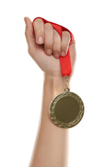 Obraz na płótnie Canvas Woman holding golden medal on white background, closeup. Space for design