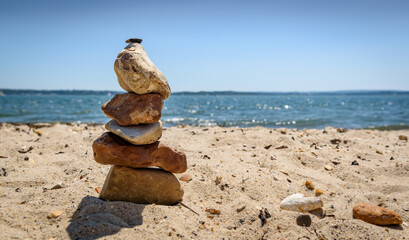 Easy pebble stack on a sandy beach
