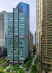 Aerial view of modern glass and steel skyscrapers and empty city streets in downtown Vancouver Canada