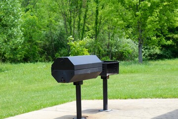 A close view of the black grill in the park.