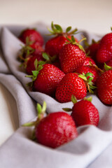 strawberries in a bowl on a white background