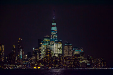 Winter cruise . New York City skyline by night. View from Hudson river, New York, USA, America. 