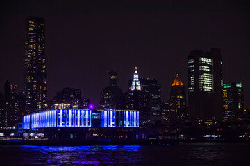 Winter cruise . New York City skyline by night. View from Hudson river, New York, USA, America. 