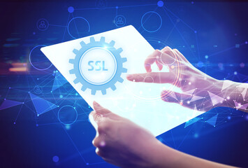 Hand holdig futuristic tablet with SSL inscription, modern technology concept