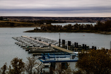 Only a coupleof boats in the slips in mid fall. Saskatchewan Landing Provincial Park, Saskatchewan, Canada